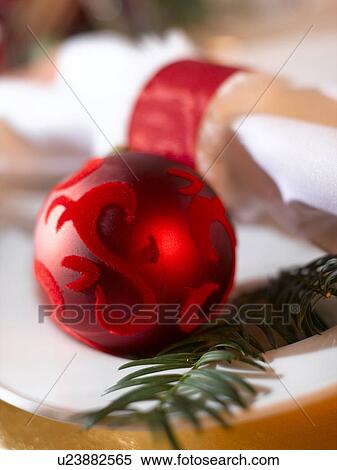 Place cover with a white napkin, a red Christmas tree ball and a fir branch View Large Photo Image Stock Photography - Place cover with a white napkin, a red Christmas tree ball and a fir branch. Fotosearch