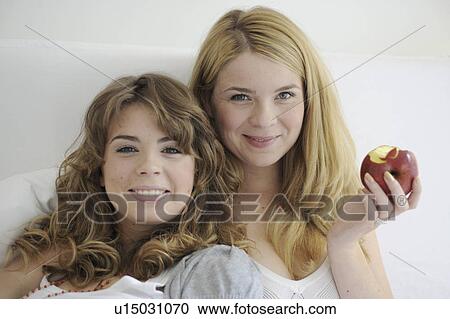 Portrait of two young women View Large Photo Image Stock Image - Portrait of two young women. Fotosearch