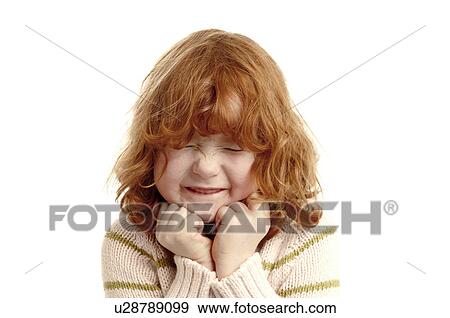 Red haired girl makes a face View Large Photo Image Stock Photo - Red haired girl makes a face. Fotosearch