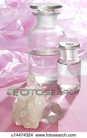Rock crystal and small bottles View Large Photo Image Picture - Rock crystal and small bottles. Fotosearch