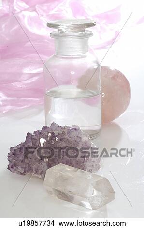 Rock crystal and small bottles View Large Photo Image Picture - Rock crystal and small bottles. Fotosearch