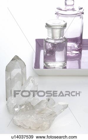 Rock crystal and small bottles View Large Photo Image Stock Photo - Rock crystal and small bottles. Fotosearch