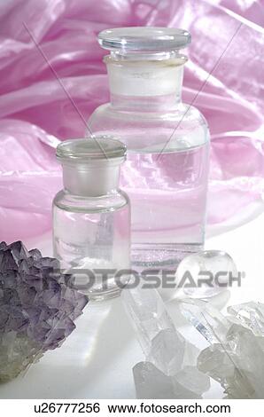 Rock crystal and small bottles View Large Photo Image Stock Photograph - Rock crystal and small bottles. Fotosearch