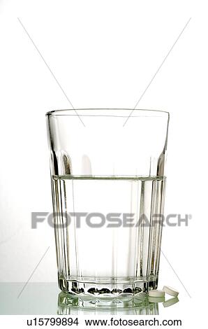 Schüssler Salz Tabletten mit einem Glas Wasser View Large Photo Image Picture - Schüssler Salz Tabletten mit einem Glas Wasser. Fotosearch