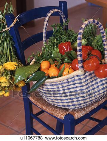 Stock Photo - shopping basket with vegetables. Fotosearch