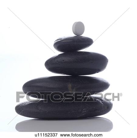 Stone towers with Schüßler salt tablet on top View Large Photo Image Stock Photo - Stone towers with Schüßler salt tablet on top. Fotosearch