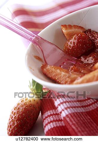 Stock Image - Strawberries in a bowl. Fotosearch