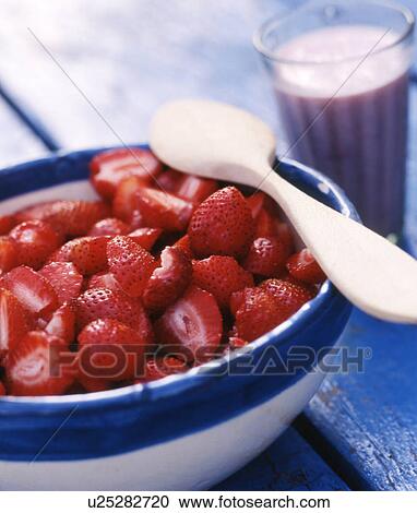 Stock Image - strawberries in a bowl. Fotosearch