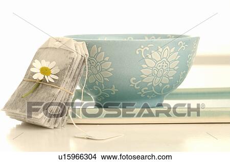 Picture - Tea bag with chamomile. Fotosearch