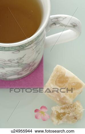 Tea cup with rock candy View Large Photo Image Picture - Tea cup with rock candy. Fotosearch