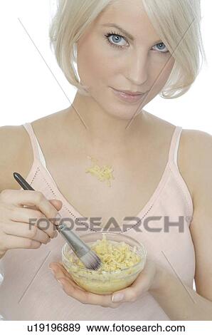 Teenage girl stirring pineapple for exfoliation View Large Photo Image Stock Photo - Teenage girl stirring pineapple for exfoliation. Fotosearch