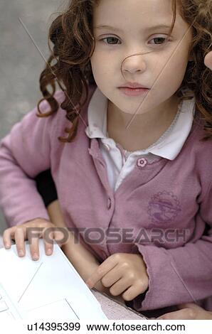 Stock Photo - Thoughtful child. Fotosearch