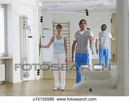 Stock Image - training with flexibar. Fotosearch