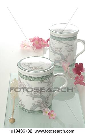 Two asian tea cups with lid View Large Photo Image Stock Image - Two asian tea cups with lid. Fotosearch