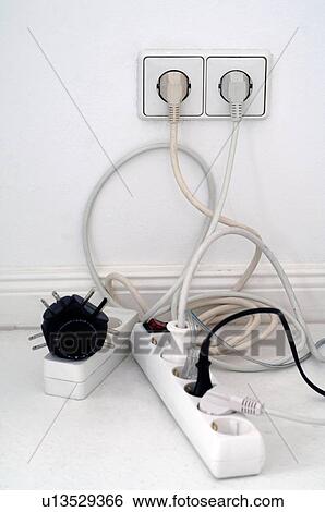 Stock Photograph - Two multiple plugs with power plugs. Fotosearch