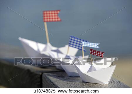 Two paper boats View Large Photo Image Stock Photography - Two paper boats. Fotosearch