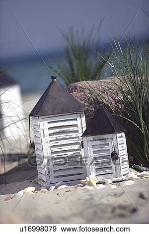 Two table lanterns and beach grass View Large Photo Image Stock Photo - Two table lanterns and beach grass. Fotosearch