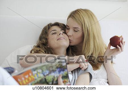 two women kissing View Large Photo Image Stock Image - two women kissing. Fotosearch