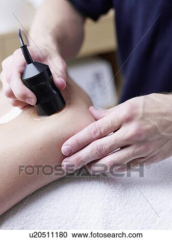 Stock Image - ultrasonic unit for the elbow. Fotosearch