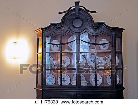 Vitrine with ornate crockery View Large Photo Image Stock Photo - Vitrine with ornate crockery. Fotosearch