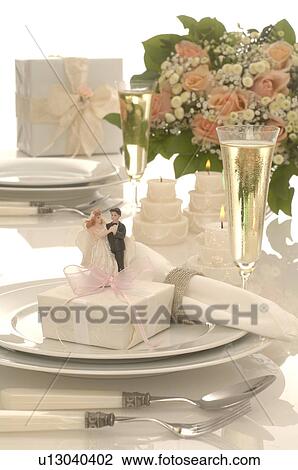 Wedding desk with bridal couple and a gift View Large Photo Image Stock Image - Wedding desk with bridal couple and a gift. Fotosearch
