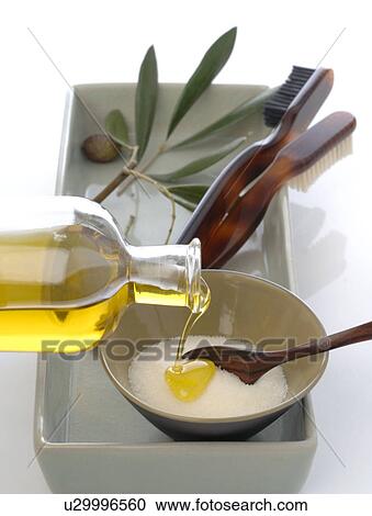 Stock Image - White teeth with olive oil and salt. Fotosearch