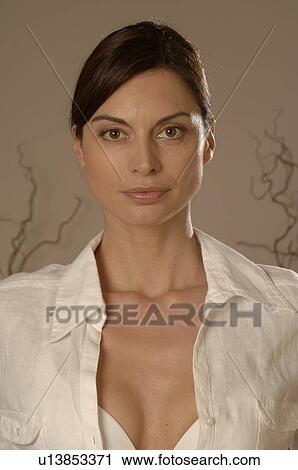 Woman dressed in white, close up View Large Photo Image Stock Image - Woman dressed in white, close up. Fotosearch