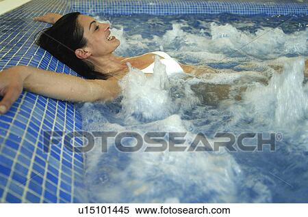Woman in a whirlpool View Large Photo Image Stock Photography - Woman in a whirlpool. Fotosearch