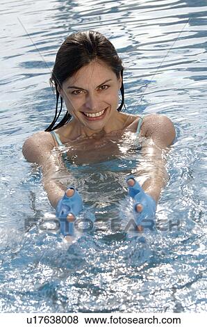 Woman in swimming pool View Large Photo Image Stock Photo - Woman in swimming pool. Fotosearch