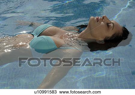 Woman is doing backstroke View Large Photo Image Stock Image - Woman is doing backstroke. Fotosearch
