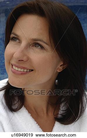 Stock Photo - Woman looking up. Fotosearch