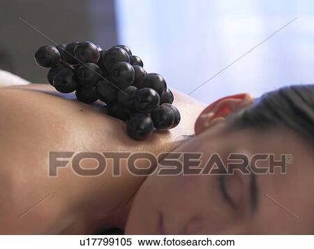 Stock Photography - Woman lying on a massage table. Fotosearch