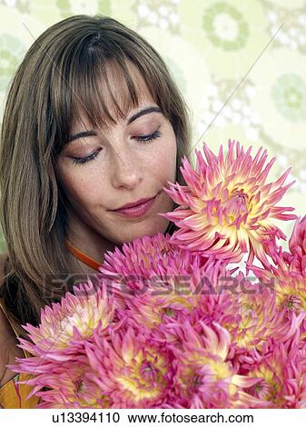 Woman with a bouquet of chrysanthemum View Large Photo Image Stock Image - Woman with a bouquet of chrysanthemum. Fotosearch