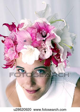 Woman with a flower cap View Large Photo Image Stock Image - Woman with a flower cap. Fotosearch