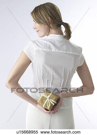 Woman with a gift View Large Photo Image Stock Photography - Woman with a gift. Fotosearch