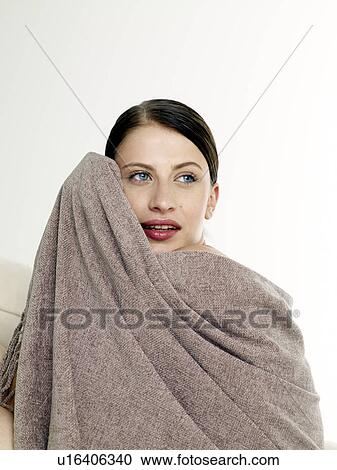 Stock Image - Woman with a sheet. Fotosearch