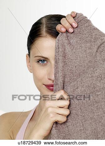 Woman with a sheet View Large Photo Image Stock Photo - Woman with a sheet. Fotosearch