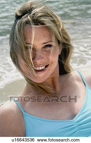Woman with a turqoise bikini View Large Photo Image Stock Photograph - Woman with a turqoise bikini. Fotosearch