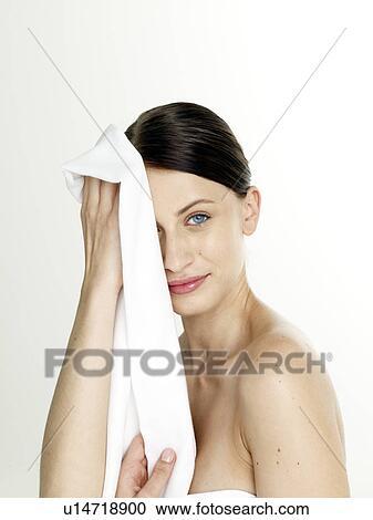 Stock Image - Woman with a white sheet. Fotosearch