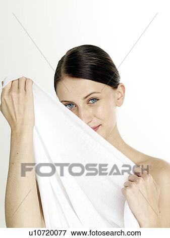 Woman with a white sheet View Large Photo Image Stock Photo - Woman with a white sheet. Fotosearch