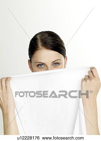 Woman with a white sheet View Large Photo Image Stock Photograph - Woman with a white sheet. Fotosearch