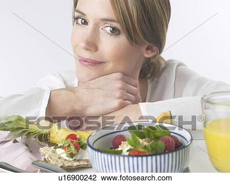 Woman with brakfast table View Large Photo Image Stock Image - Woman with brakfast table. Fotosearch