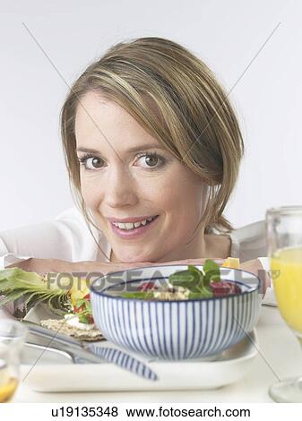Woman with brakfast table View Large Photo Image Stock Photo - Woman with brakfast table. Fotosearch
