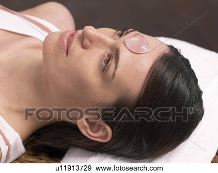 Stock Photo - Woman with gemstone on her forehead. Fotosearch