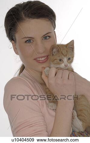 Woman with kitty View Large Photo Image Stock Photo - Woman with kitty. Fotosearch