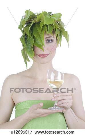 Woman with leaves on her head drinking red wine View Large Photo Image Stock Photo - Woman with leaves on her head drinking red wine. Fotosearch