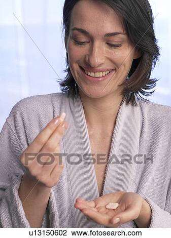 Woman with pills View Large Photo Image Stock Image - Woman with pills. Fotosearch