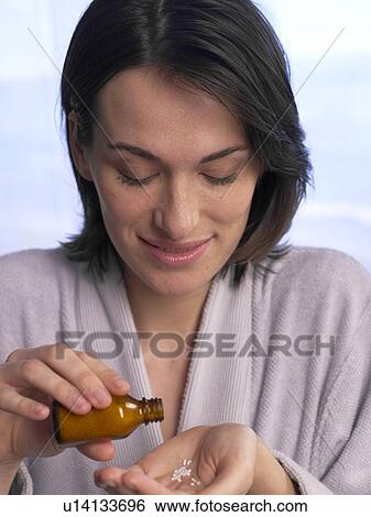 Woman with pills View Large Photo Image Stock Photograph - Woman with pills. Fotosearch