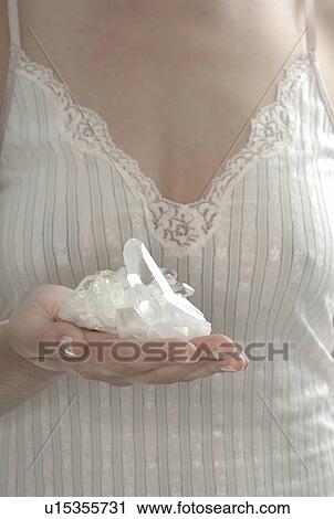 Woman with rock crystal View Large Photo Image Stock Image - Woman with rock crystal. Fotosearch