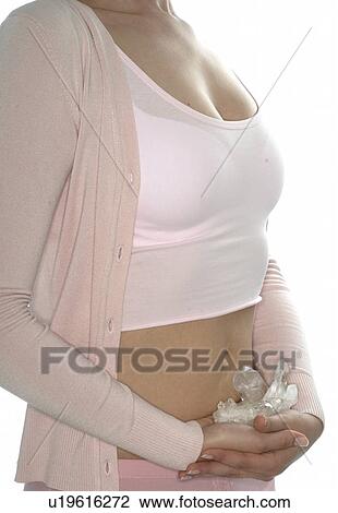 Woman with rock crystal View Large Photo Image Stock Image - Woman with rock crystal. Fotosearch